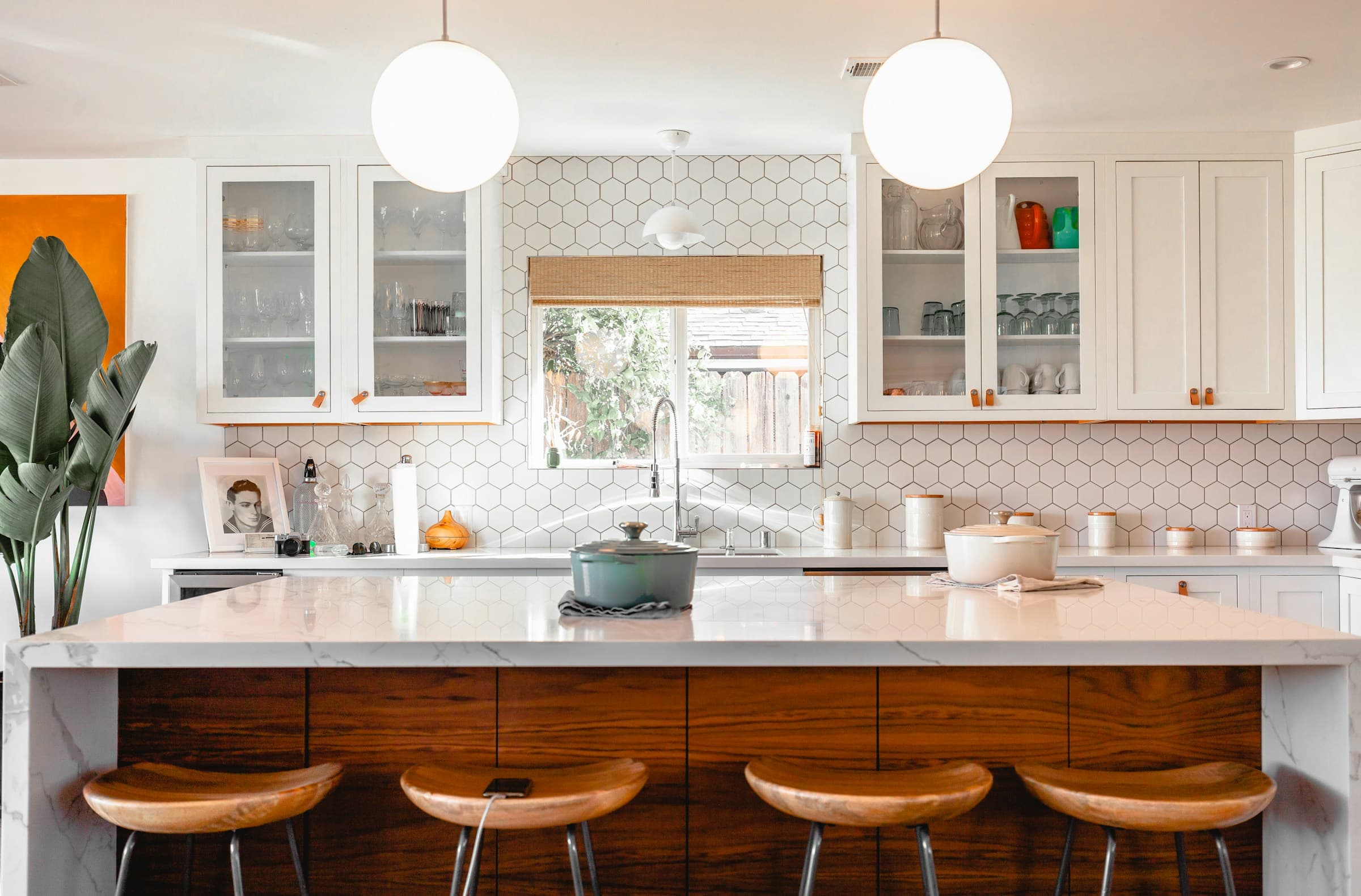 Bright, updated kitchen with a marble island