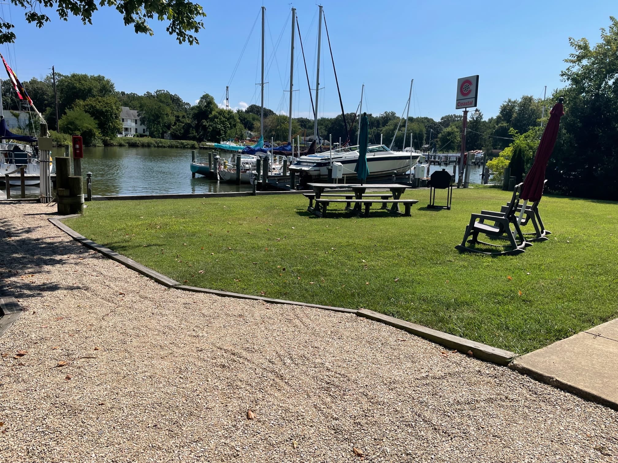 Sailboats docked at a marina in Shady Side
