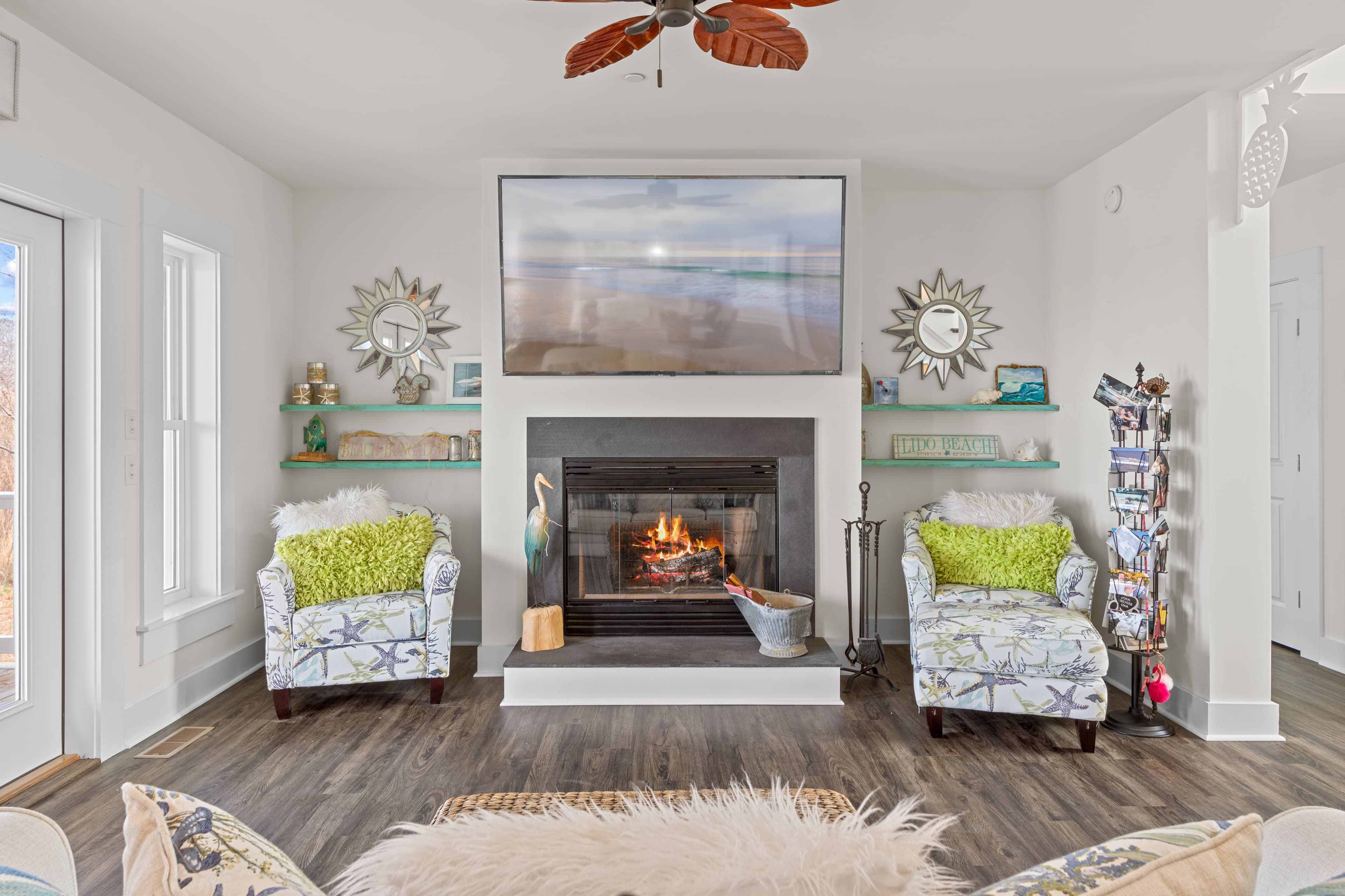 Living room with fireplace at 7650 Ferry Cove Road